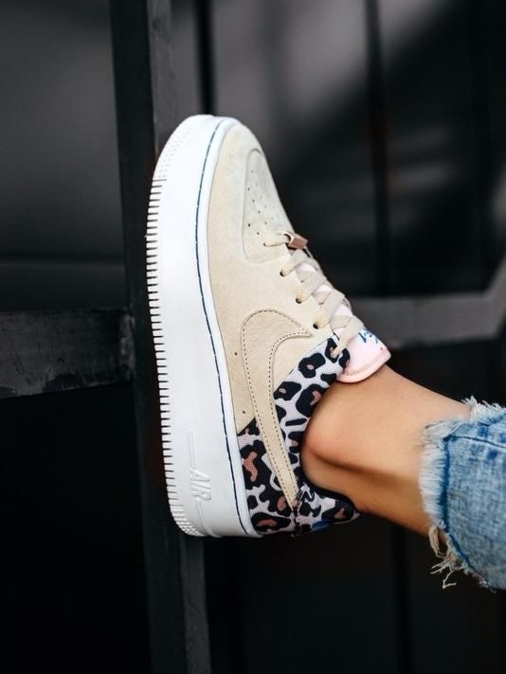 Nike Women’s Beige Sneakers with Leopard Accent